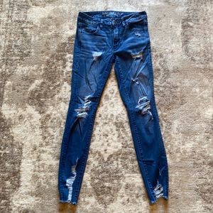 AE distressed super stretch jeans